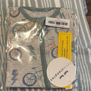 NIB Little Sleepies Let’s Ride Zippy size newborn